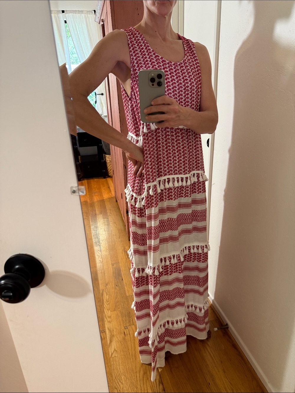 Jasper Living tiered, sleeveless, red + white maxi dress with tassel trim.